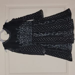 Dress and pants set for a girl.